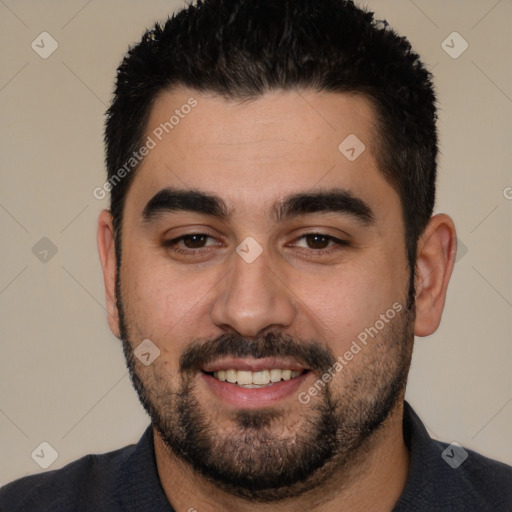 Joyful white young-adult male with short  black hair and brown eyes