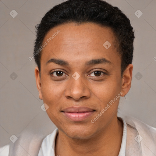 Joyful black young-adult female with short  black hair and brown eyes