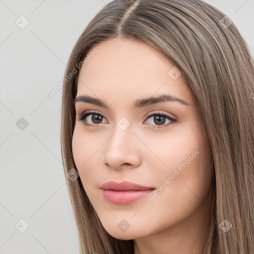 Neutral white young-adult female with long  brown hair and brown eyes