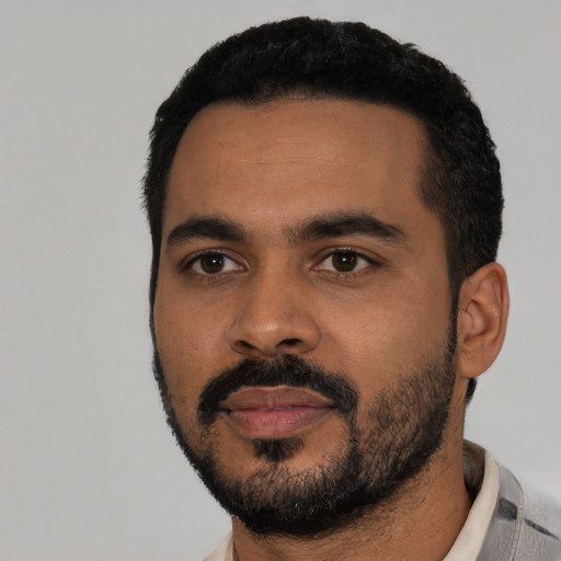 Neutral latino young-adult male with short  black hair and brown eyes