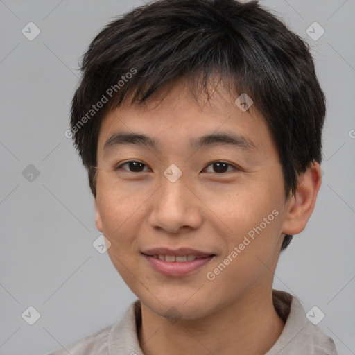 Joyful asian young-adult male with short  brown hair and brown eyes