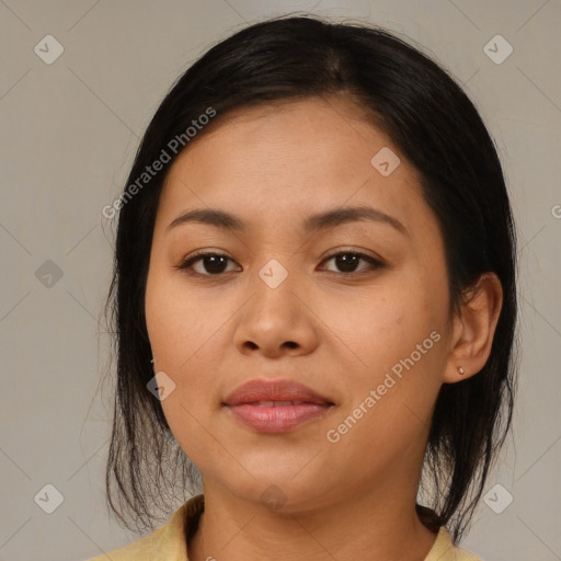 Joyful asian young-adult female with medium  brown hair and brown eyes