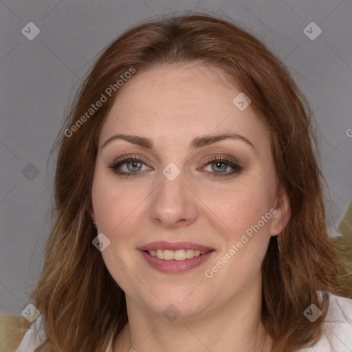 Joyful white young-adult female with medium  brown hair and blue eyes