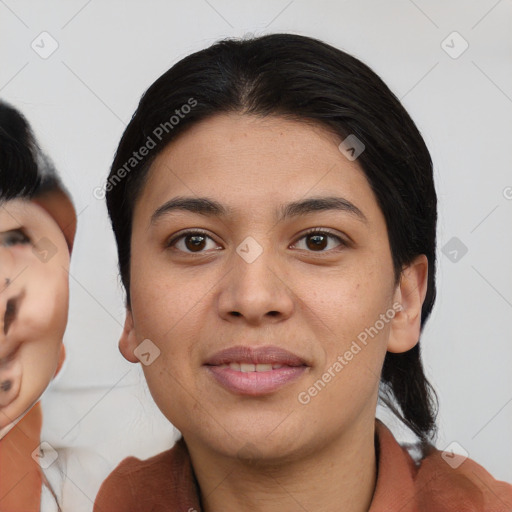 Joyful asian young-adult female with medium  black hair and brown eyes