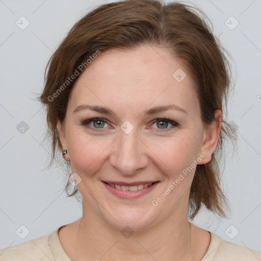 Joyful white adult female with medium  brown hair and grey eyes