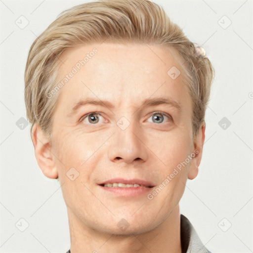 Joyful white adult male with short  brown hair and grey eyes
