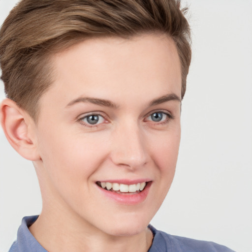 Joyful white young-adult female with short  brown hair and grey eyes