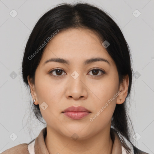 Joyful latino young-adult female with medium  brown hair and brown eyes