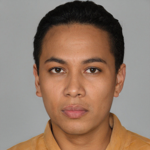 Neutral latino young-adult male with short  black hair and brown eyes