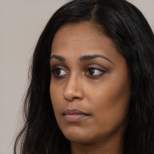 Neutral asian young-adult female with long  black hair and brown eyes