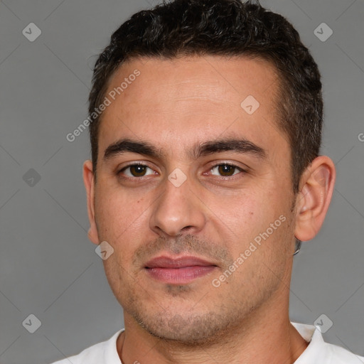 Joyful white young-adult male with short  brown hair and brown eyes