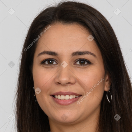 Joyful white young-adult female with long  brown hair and brown eyes