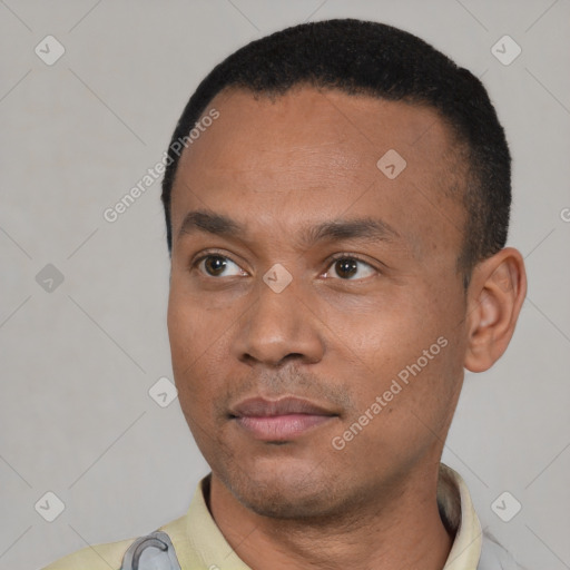 Neutral latino young-adult male with short  black hair and brown eyes