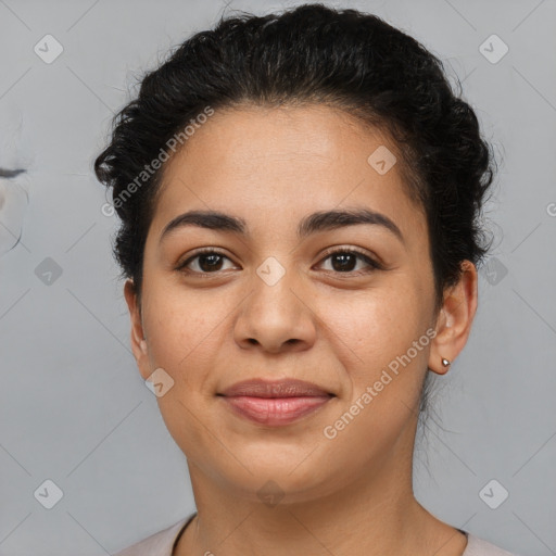 Joyful latino young-adult female with short  brown hair and brown eyes