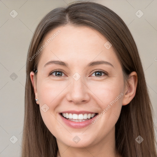 Joyful white young-adult female with long  brown hair and grey eyes