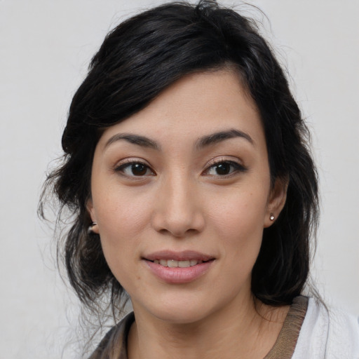 Joyful white young-adult female with medium  black hair and brown eyes