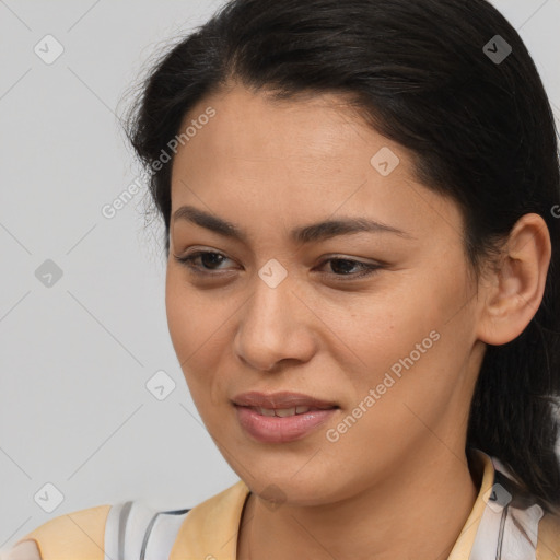 Joyful latino young-adult female with medium  brown hair and brown eyes