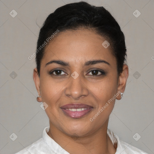 Joyful latino young-adult female with short  black hair and brown eyes