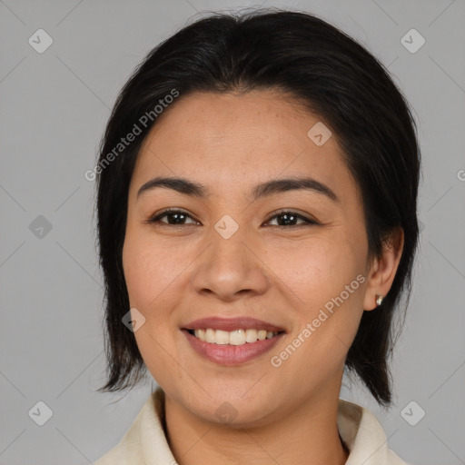 Joyful asian young-adult female with medium  brown hair and brown eyes