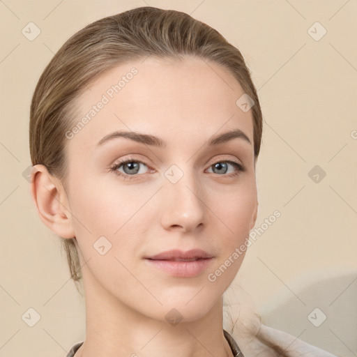 Neutral white young-adult female with short  brown hair and grey eyes