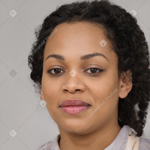 Joyful black young-adult female with medium  black hair and brown eyes