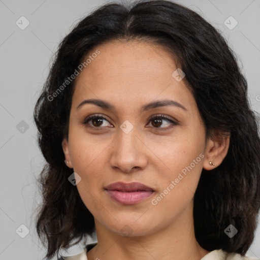 Joyful latino young-adult female with medium  brown hair and brown eyes