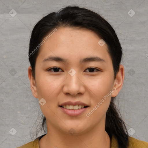 Joyful asian young-adult female with short  brown hair and brown eyes