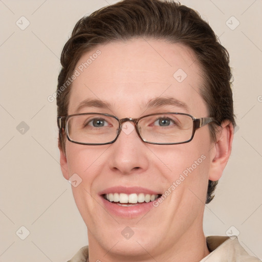 Joyful white adult female with short  brown hair and grey eyes