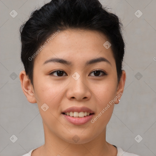 Joyful asian young-adult female with short  brown hair and brown eyes