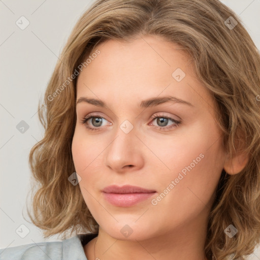 Joyful white young-adult female with medium  brown hair and green eyes