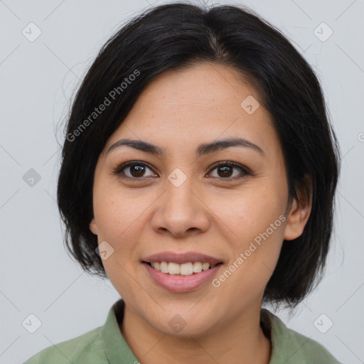 Joyful asian young-adult female with medium  brown hair and brown eyes