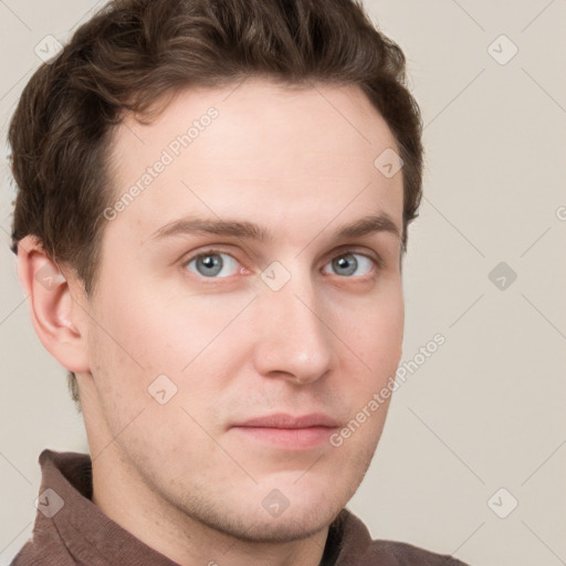 Neutral white young-adult male with short  brown hair and grey eyes