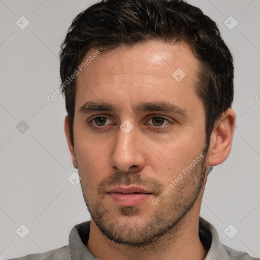 Neutral white young-adult male with short  brown hair and brown eyes