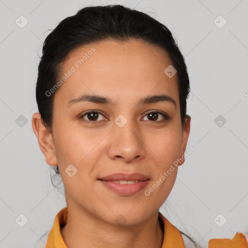 Joyful latino young-adult female with short  brown hair and brown eyes