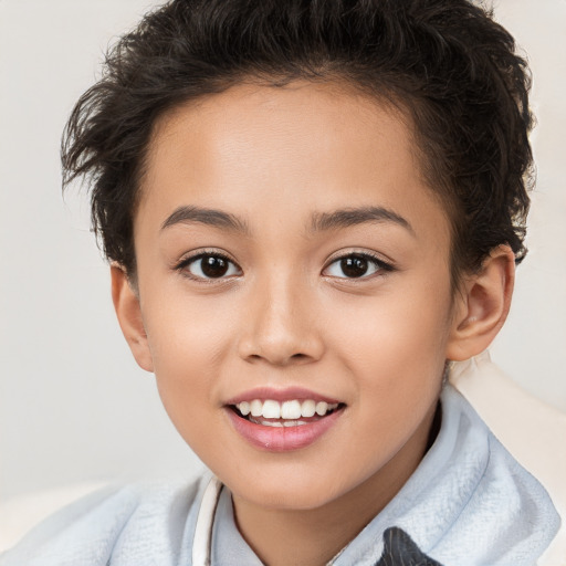 Joyful white child female with short  brown hair and brown eyes