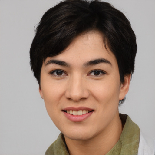 Joyful asian young-adult female with medium  brown hair and brown eyes