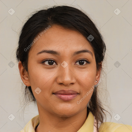 Joyful latino young-adult female with medium  brown hair and brown eyes