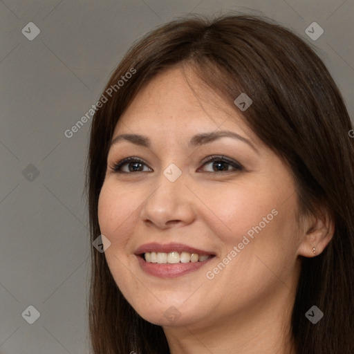 Joyful white young-adult female with long  brown hair and brown eyes