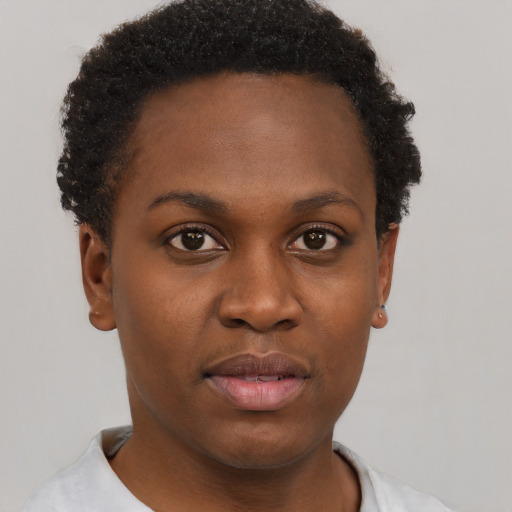 Neutral black young-adult female with short  brown hair and brown eyes