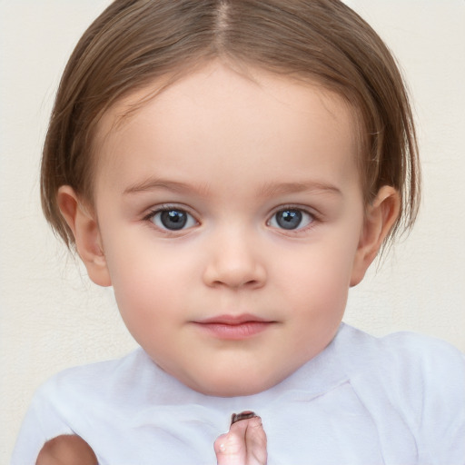 Neutral white child female with short  brown hair and blue eyes