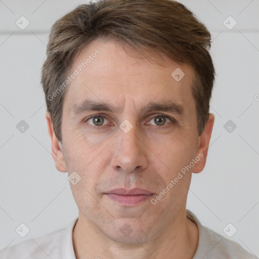 Neutral white adult male with short  brown hair and grey eyes