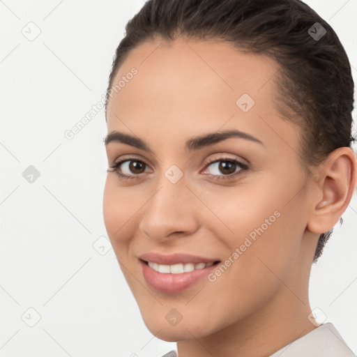 Joyful white young-adult female with short  brown hair and brown eyes