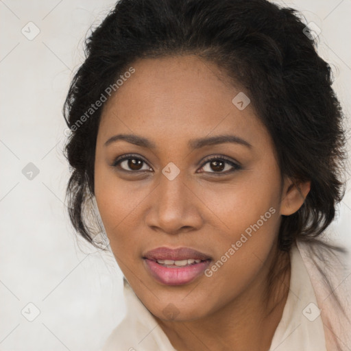 Joyful black young-adult female with long  brown hair and brown eyes