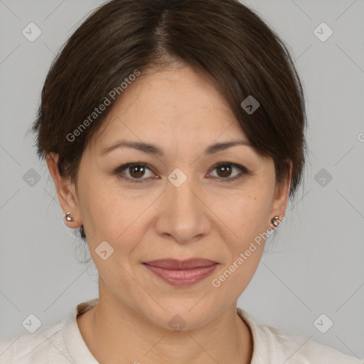 Joyful white adult female with medium  brown hair and brown eyes