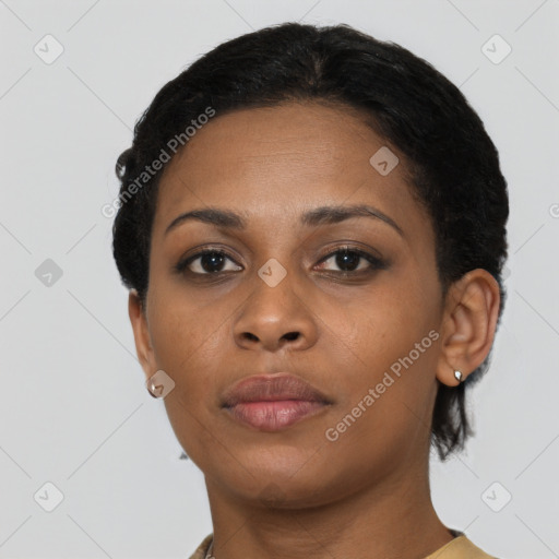 Neutral black young-adult female with short  brown hair and brown eyes