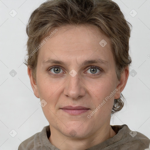 Joyful white adult female with short  brown hair and grey eyes