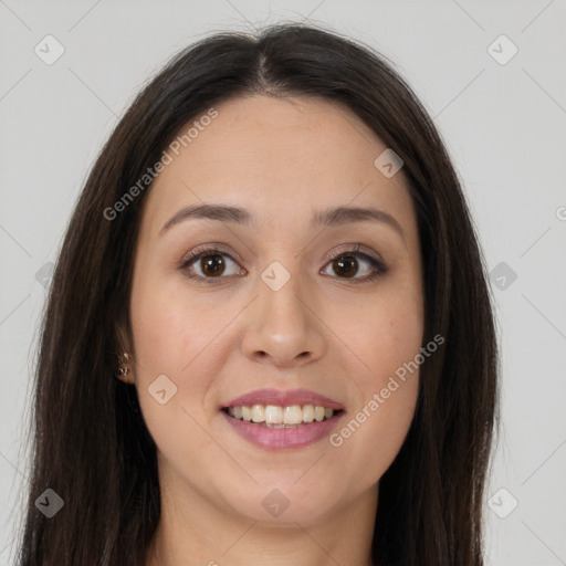 Joyful white young-adult female with long  brown hair and brown eyes