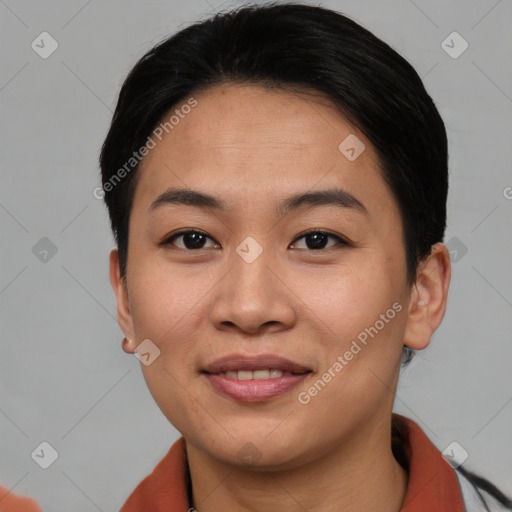 Joyful asian young-adult female with short  brown hair and brown eyes