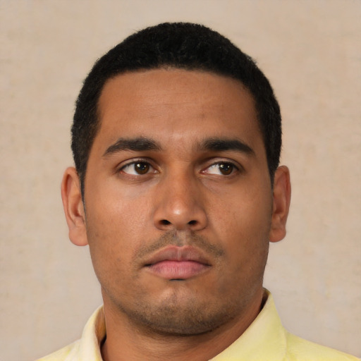 Neutral latino young-adult male with short  black hair and brown eyes