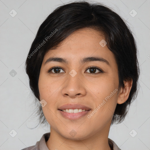 Joyful asian young-adult female with medium  black hair and brown eyes